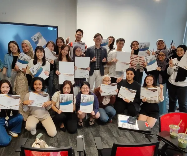 Workshop cohort celebrating with certificates