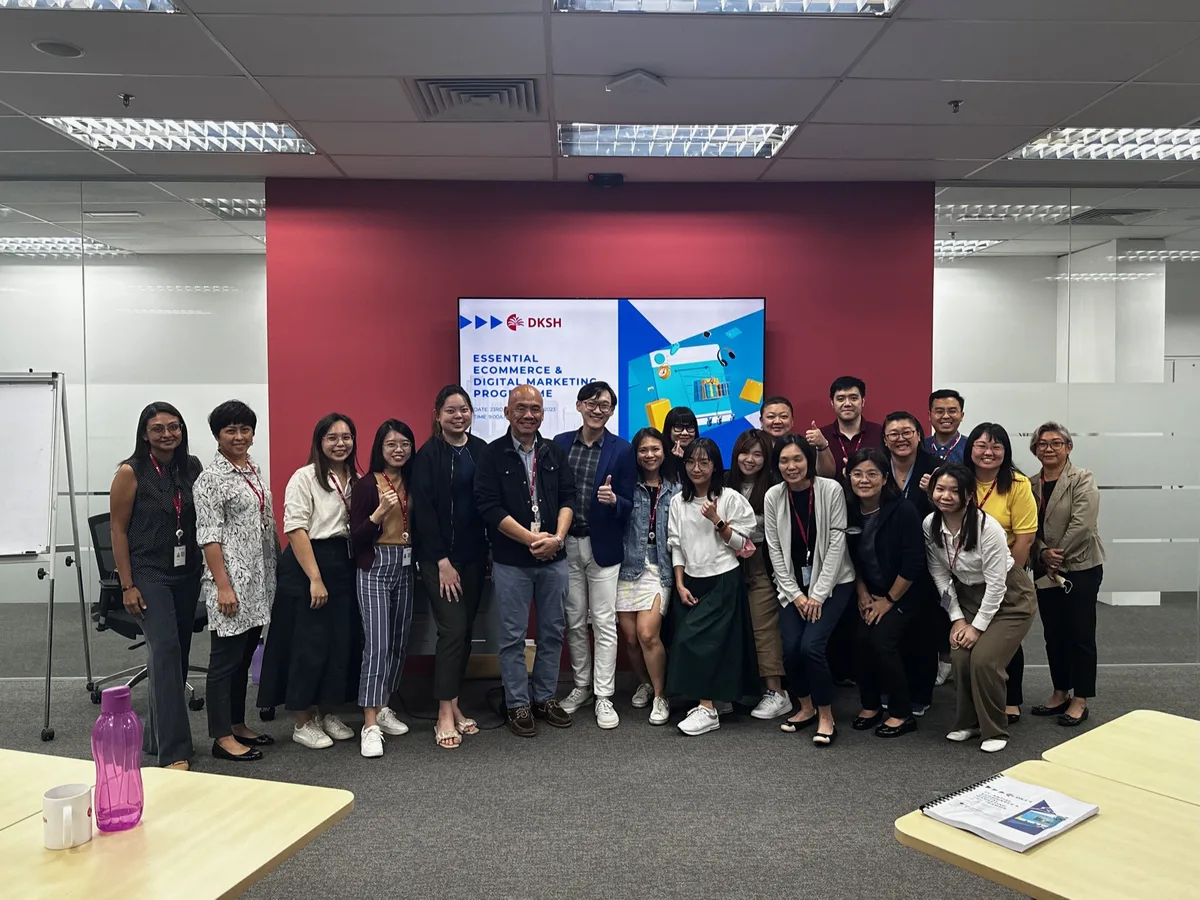 Participants and trainer from a Media Funnel in-house AI and digital marketing training session posing together in a training room